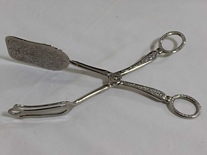 Silver plated bread/cake tongs Two Available Bid per item)