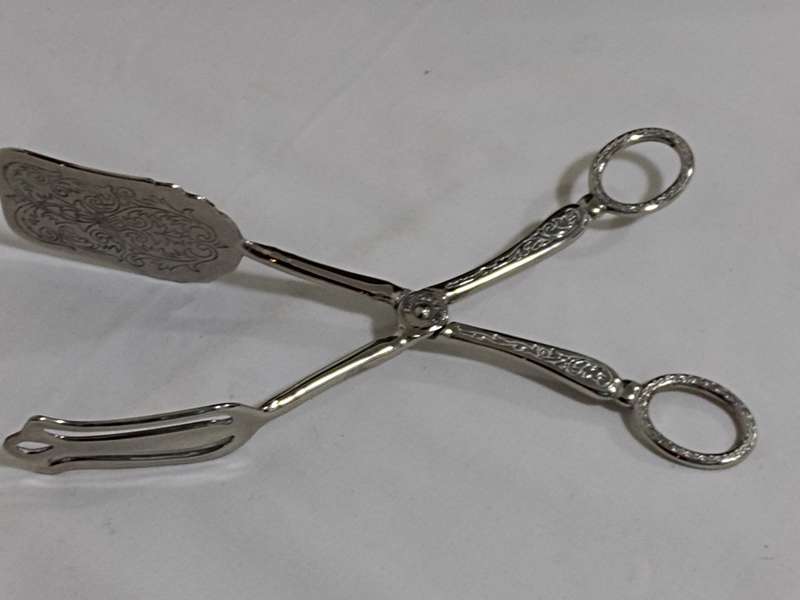 Silver plated bread/cake tongs Two Available Bid per item)