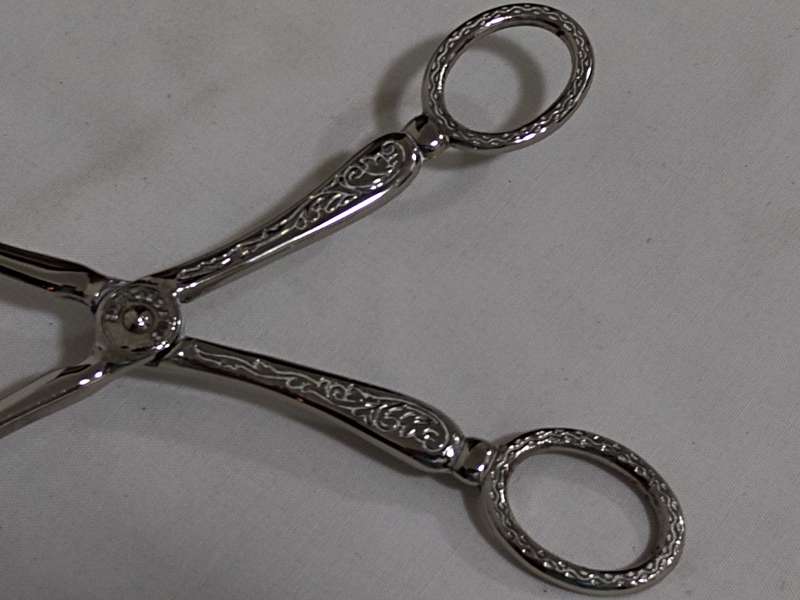 Silver plated bread/cake tongs Two Available Bid per item)
