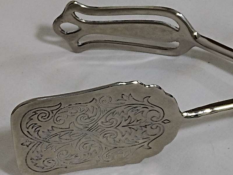 Silver plated bread/cake tongs Two Available Bid per item)