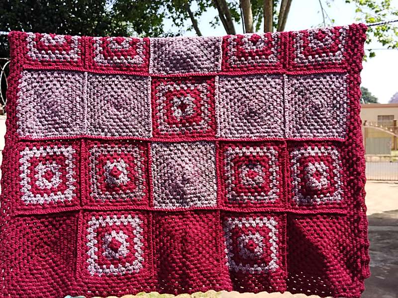 Small wine red crochet blanket