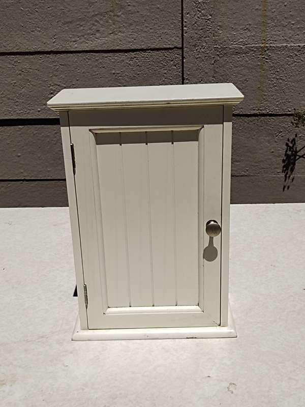 Small white bathroom cupboard
