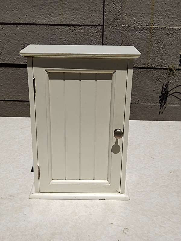 Small white bathroom cupboard