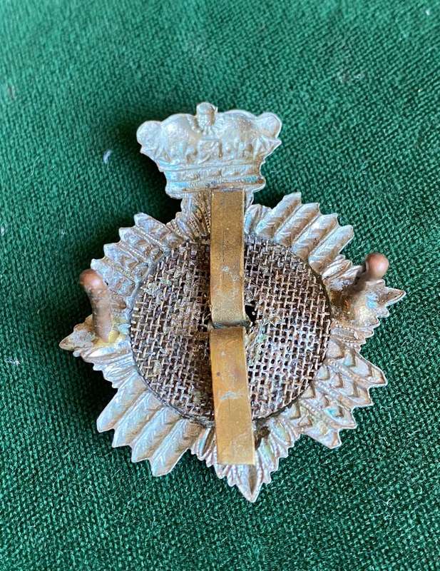 DUKE OF EDINBURGH'S OWN VOLUNTEER RIFLES WHITE METAL CAP BADGE-WORN 1902-1922-LUGS INTACT- MEASURES