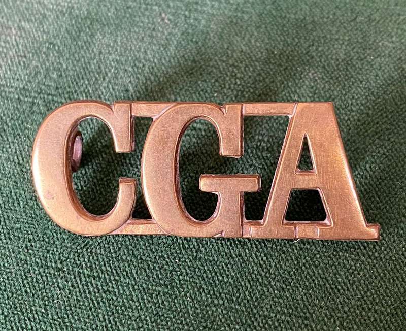 CAPE GARRISON ARTILLERY,BRASS SHOULDER TITLE-WORN FROM 1902- 2 LUGS