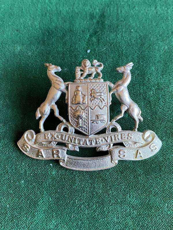 SOUTH AFRICAN RAILWAYS,WHITE METAL CAP BADGE-2 LUGS