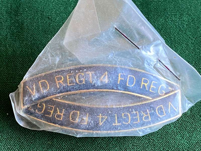 4 FIELD REGIMENT METAL AND ENAMEL SHOULDER TITLE PAIR-STILL SEALED IN PACKAGE,AS FROM METAL ART-ALL