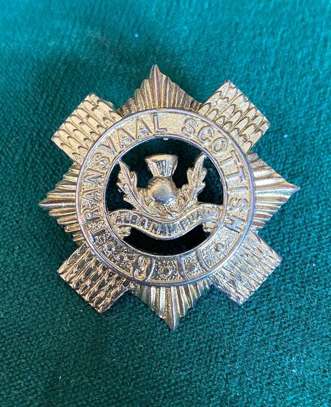 TRANSVAL SCOTTISH BRASS SPORRAN BADGE-WORN POST 1932- 2 LUGS