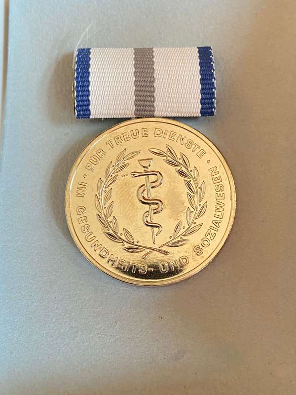 EAST GERMAN DDR-MEDAL FOR FAITHFUL SERVICE IN THE HEALTH AND SOICIAL SERVICES -INSTITUTED 1973