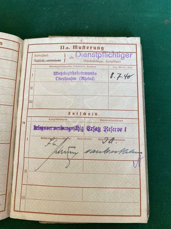 A WEHRPASS-A MILITARY PASSPORT ISSUED TO EVERY SOLDIER IN THE GERMAN WEHR MACHT DURING WW2