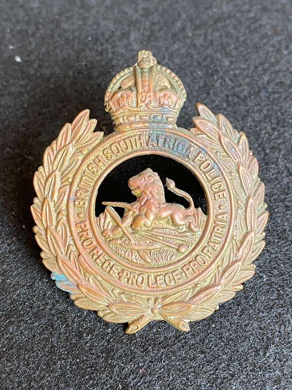 RHODESIAN BSAP HAT BADGE-WORN 1949-53-VOIDED CENTRE - 2 LUGS