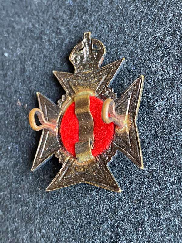 ROYAL RHODESIA REGT. K/C CAP BADGE-WORN 1947-1956-SMALLER BADGE- 2 LUGS