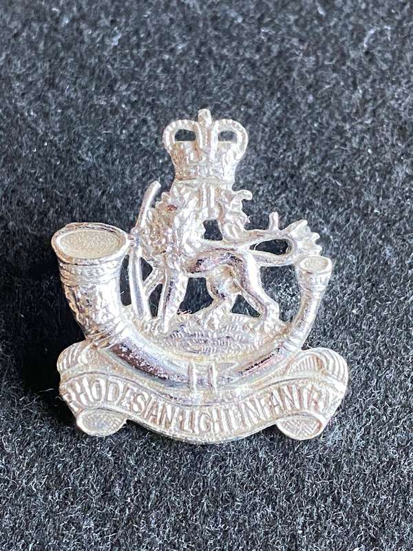 RHODESIA LIGHT INFANTRY ANODISED CAP BADGE-WORN 1964-72- 2 LUGS