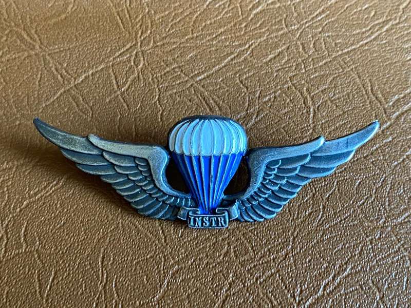 SWA PARACHUTE INSTRUCTOR WING- OXIDISED SILVER AND ENAMEL BREAST BADGE-APPROVED IN 1984- 2 PINS