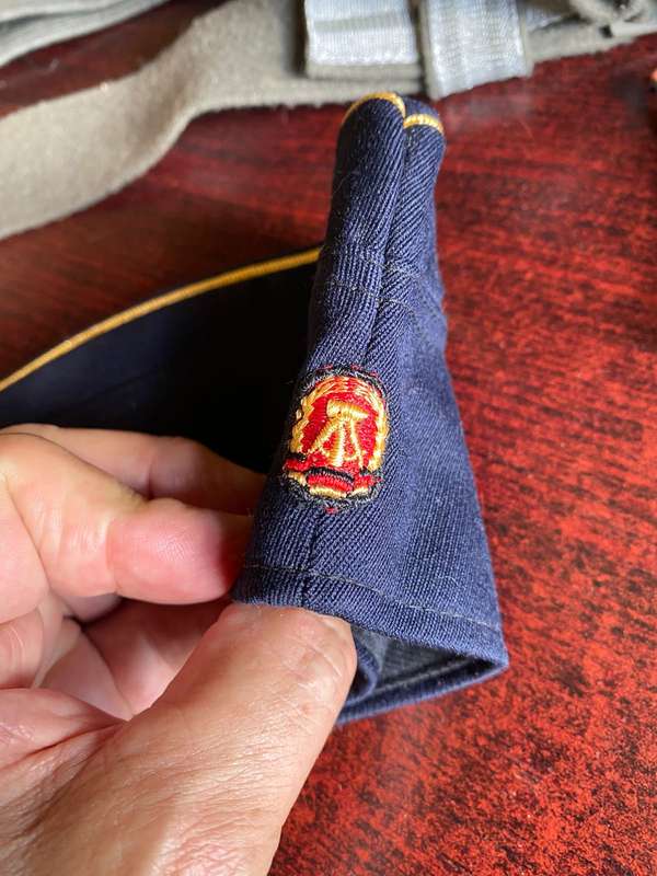 EAST GERMAN COLLECTION-2X BERET,BELT,SEALED MEDICAL AID KIT RAND AND 2X TOY SOLDIERS-CIRCA 1970'S