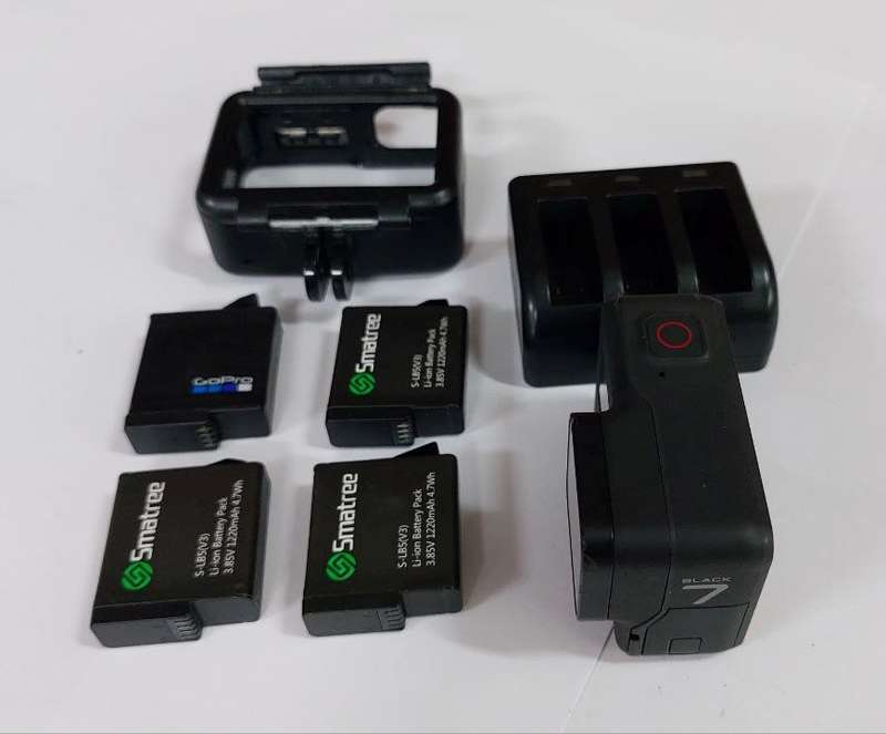 GoPro 7 Black Camera  with 4 Batteries, Charger and Frame Holder