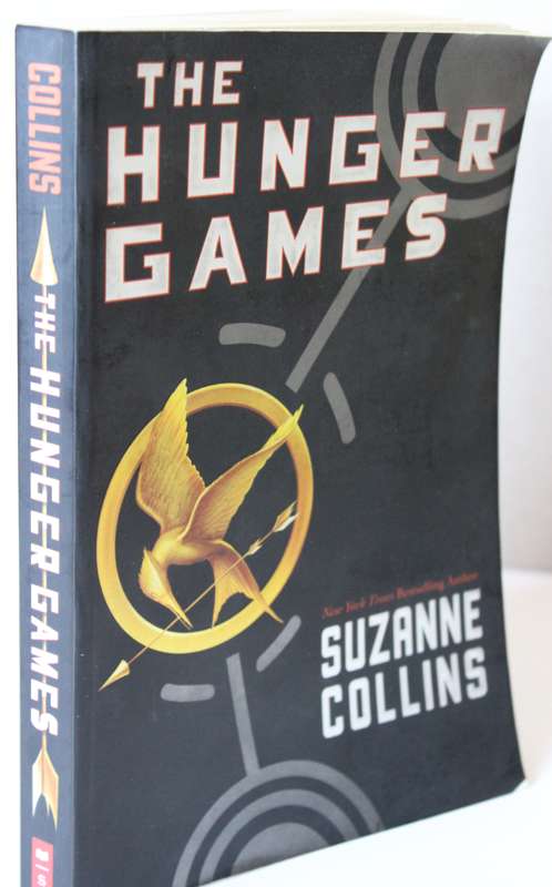 THE HUNGER GAMES by Suzanne Collins.