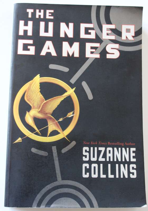 THE HUNGER GAMES by Suzanne Collins.