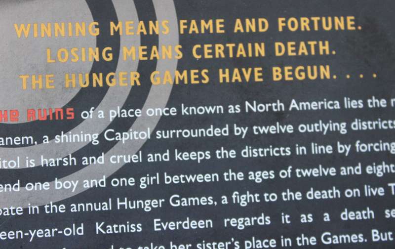 THE HUNGER GAMES by Suzanne Collins.