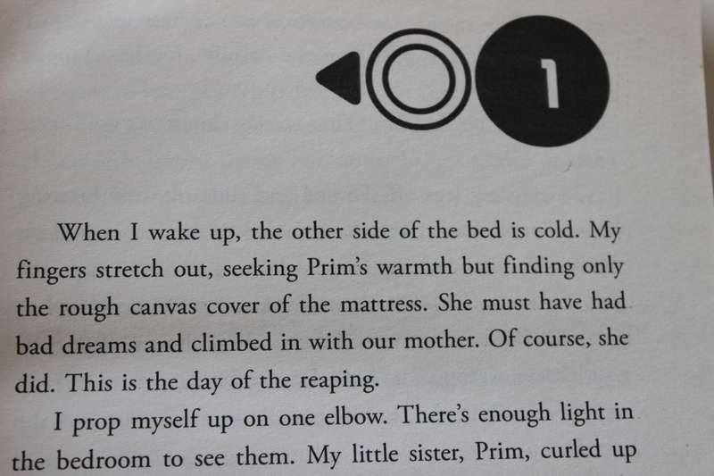 THE HUNGER GAMES by Suzanne Collins.