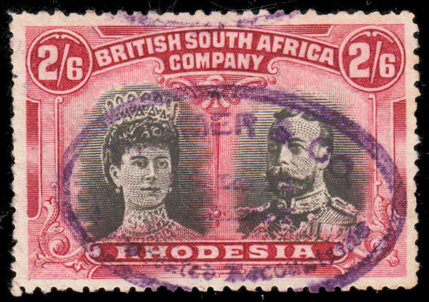 RHODESIA 1910 DOUBLE HEAD 2s6 BLACK AND LAKE WITH FISCALLY CANCEL USED, SACC 155a. FINE REFERENCE