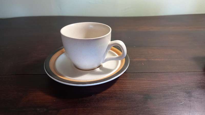 6 DEMITASSE STONE WARE CUPS AND SAUCERS PLUS 1 ESPRESSO COFFEE POT.