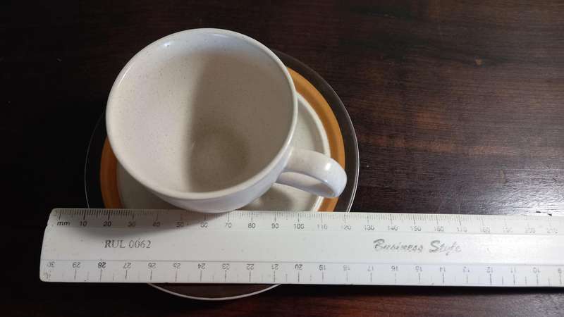 6 DEMITASSE STONE WARE CUPS AND SAUCERS PLUS 1 ESPRESSO COFFEE POT.
