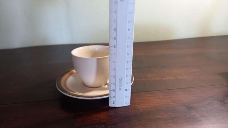 6 DEMITASSE STONE WARE CUPS AND SAUCERS PLUS 1 ESPRESSO COFFEE POT.