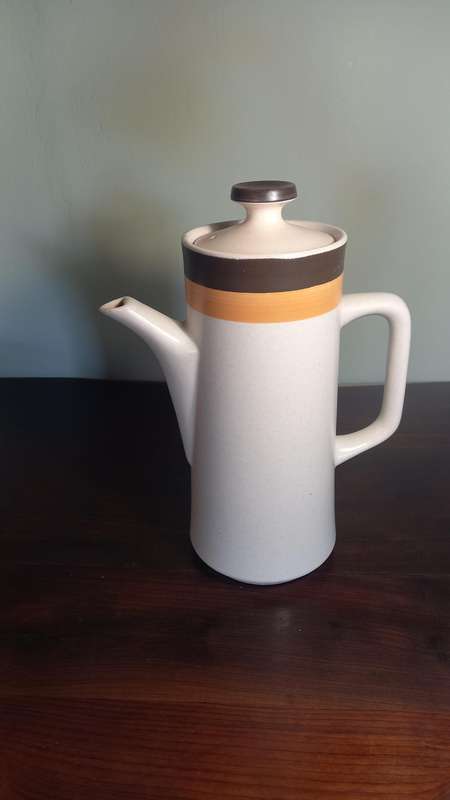 6 DEMITASSE STONE WARE CUPS AND SAUCERS PLUS 1 ESPRESSO COFFEE POT.