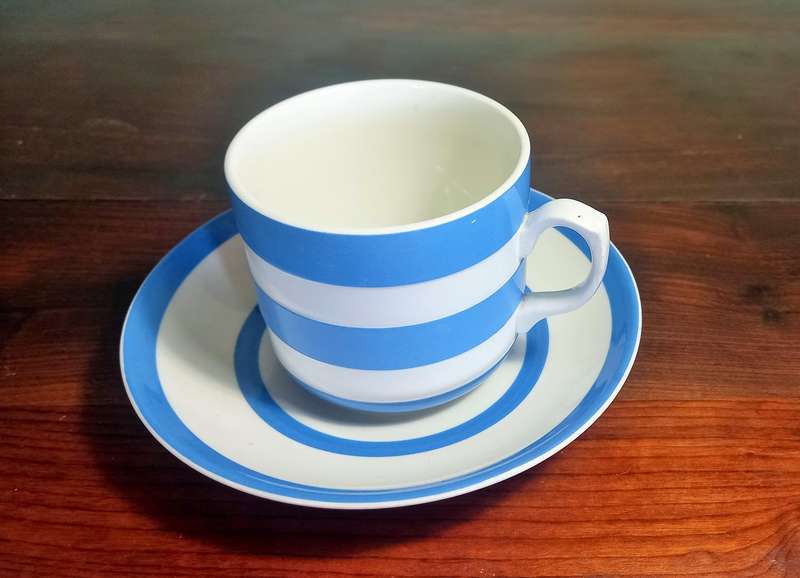 CORNISHWARE - KITCHEN WARE TEA CUP AND SAUCER