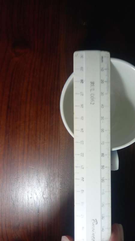 CORNISHWARE - KITCHEN WARE TEA CUP AND SAUCER