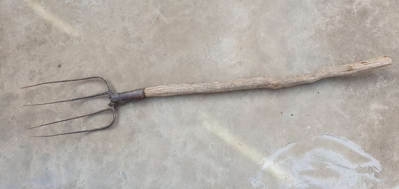 Vintage pitchfork with lots of character for decor - as per photo