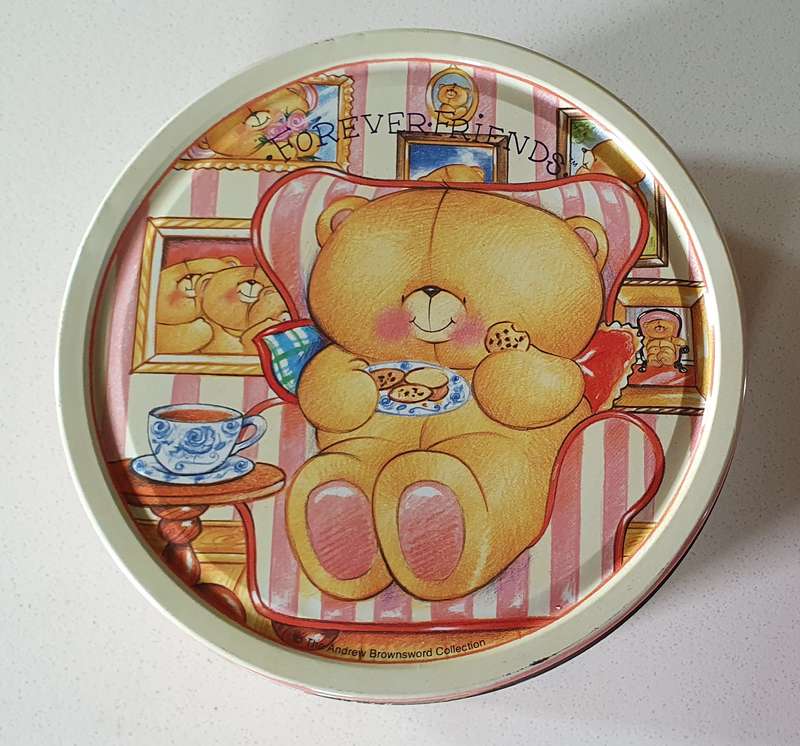 Forever friends bear tin as per photos