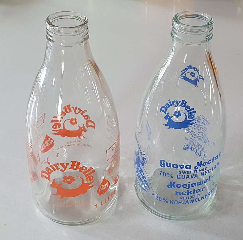 Vintage DAIRY BELL milk and juice bottles as per photo