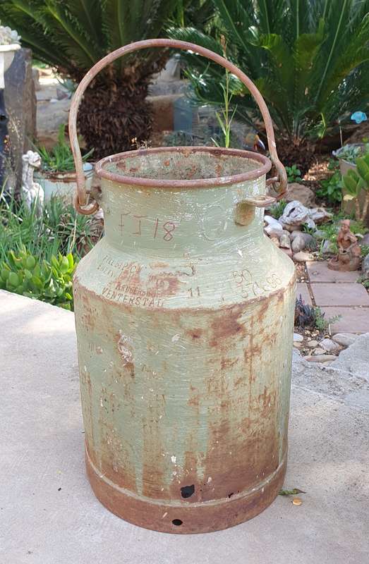 Vintage rusted milk can for garden or display as per photos