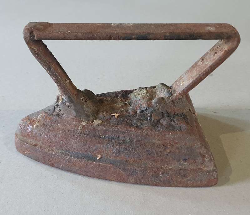 Vintage rusted cast iron, coal stove clothing Sad Iron (for door stop) as per photo