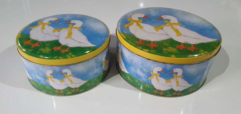 Two tins as per photos