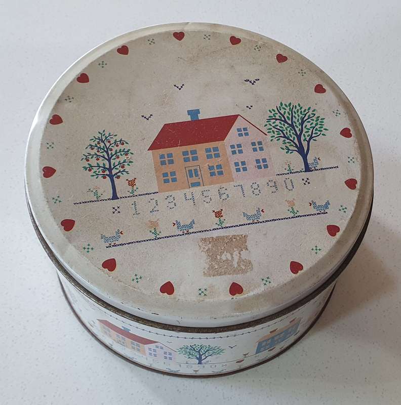 CROSS STITCH tin as per photo.