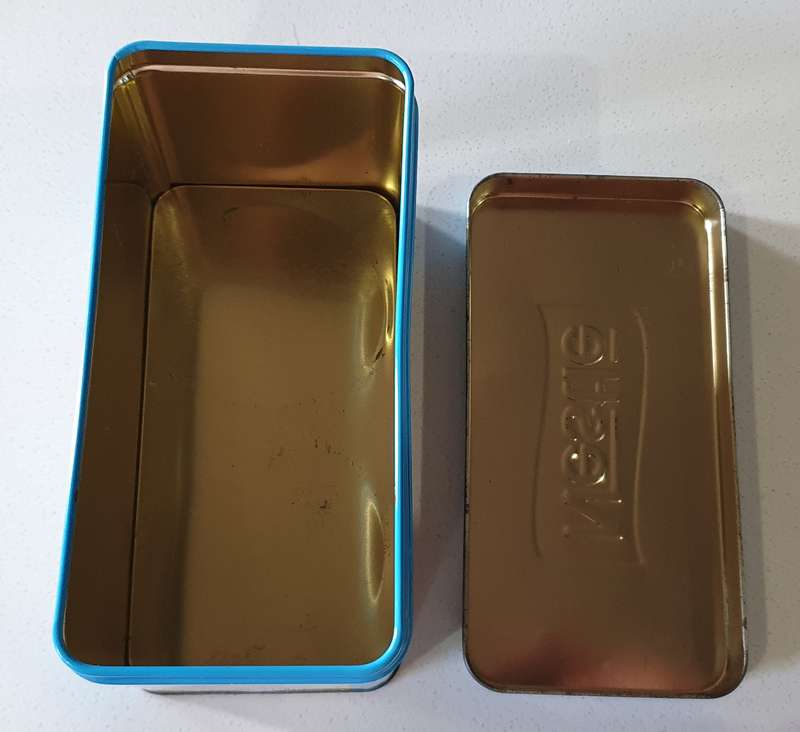 NESTLE tin as per photos