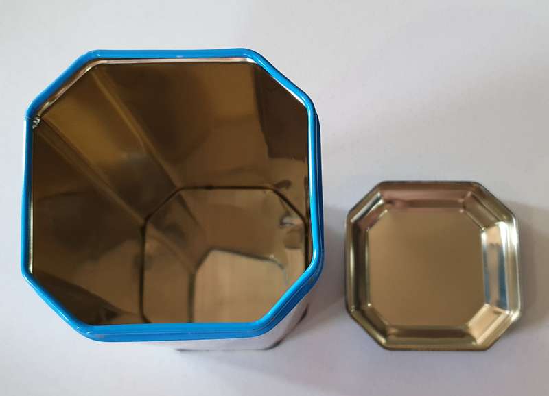 NESTLE tin as per photos