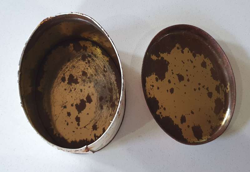 OVAL flower theme tin as per photo.