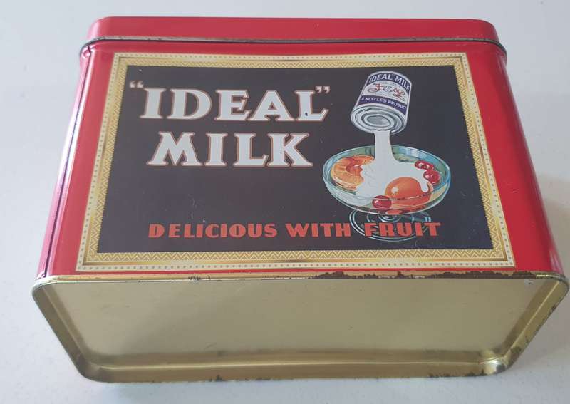 NESTLE tin as per photo