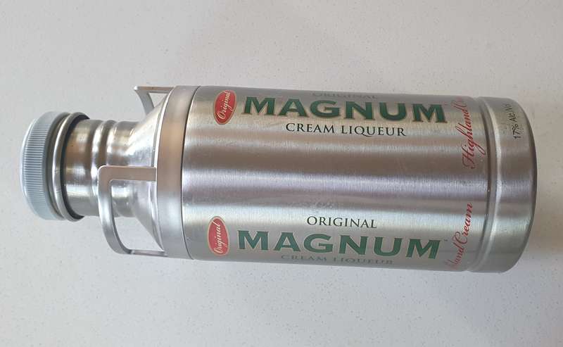 MAGNUM LIQUEUR tin as per photos