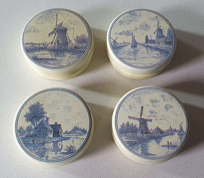 4 Small round tins as per photos