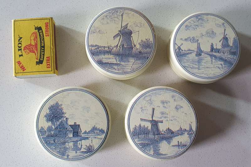 4 Small round tins as per photos
