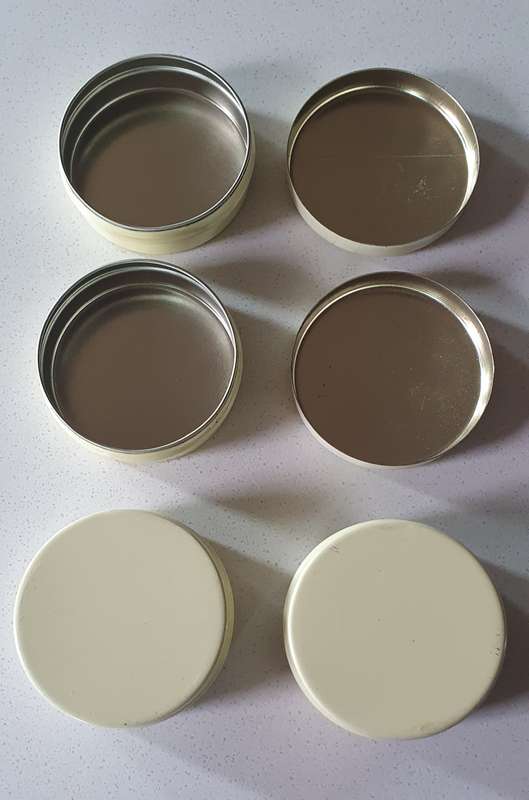 4 Small round tins as per photos