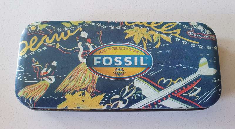 FOSSIL tin as per photos