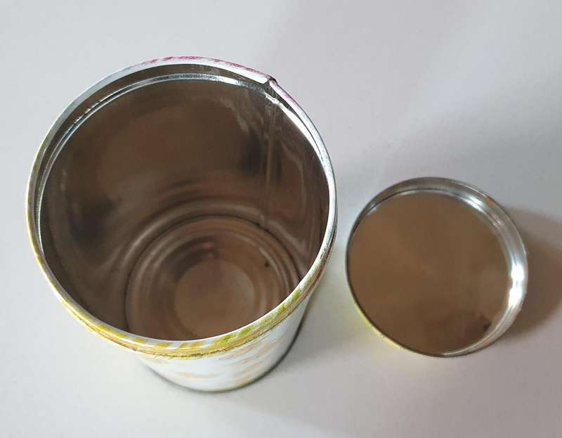 BEAR tin as per photo.