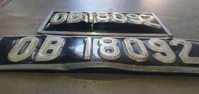 Vintage pair of plastic and metal Bloemfontein district number plate as per photos