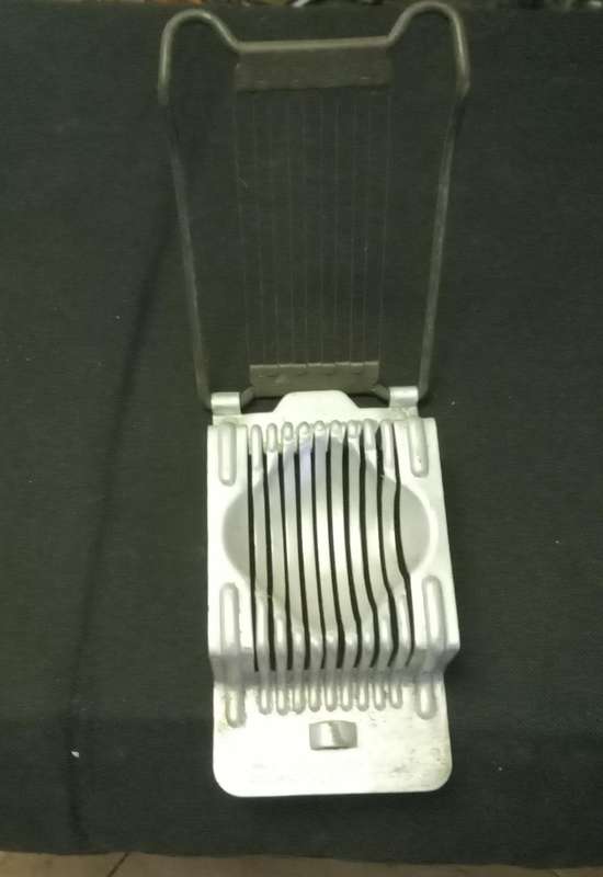 Antique egg slicer